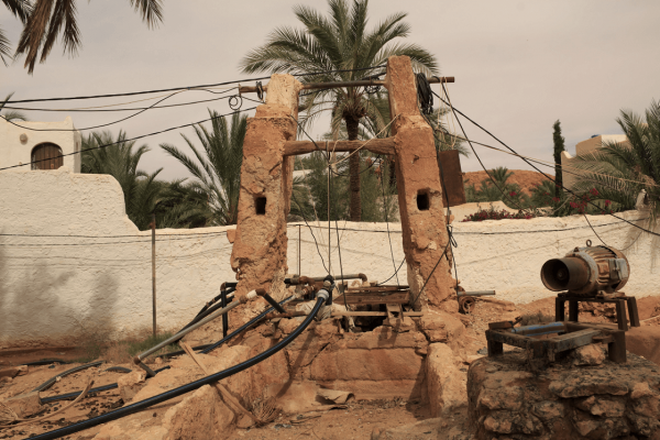 Pumping groundwater in Algeria for irrigation, using an old well with modern pumps © Meriem Farah Hamamouche